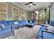 Covered patio featuring a comfortable seating arrangement and outdoor heater perfect for year-round relaxation at 783 Phil Haven Ln, Kennesaw, GA 30152