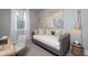 Relaxing bedroom with daybed, desk, and natural light from the window at 1726 Gunnin Nw Trce # 231, Atlanta, GA 30318