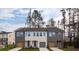 Beautiful townhome exteriors with modern color schemes and private driveways offer curb appeal at 1726 Gunnin Nw Trce # 231, Atlanta, GA 30318