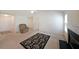 Cozy living room featuring a fireplace, vaulted ceiling, and neutral carpet, creating a comfortable atmosphere at 2374 Brandenberry Ct, Decatur, GA 30034