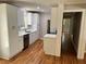 Bright kitchen featuring new white cabinets, countertops, and stainless steel appliances at 4925 Sugar Valley Sw Rd, Mableton, GA 30126