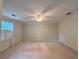 Spacious carpeted bedroom features neutral walls, a ceiling fan, and natural light from a nearby window at 2872 Bentwood Dr, Marietta, GA 30062