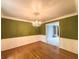 Elegant dining room with hardwood flooring, chandelier lighting, and tasteful wall decor for sophisticated dining at 2872 Bentwood Dr, Marietta, GA 30062