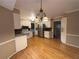 Spacious kitchen with white cabinetry, stainless steel appliances, granite countertops, and hardwood floors at 2872 Bentwood Dr, Marietta, GA 30062