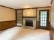 Cozy living room showcasing a brick fireplace with built-in shelving, perfect for relaxing and entertaining guests at 2872 Bentwood Dr, Marietta, GA 30062