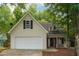 Charming home featuring a two-car garage and inviting front porch at 6 Stonebridge Se Ct, Cartersville, GA 30121