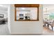 A framed kitchen view with stainless steel appliances and white cabinetry at 6 Stonebridge Se Ct, Cartersville, GA 30121