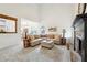 Spacious living room with fireplace, neutral tones, and open access to the dining area at 6 Stonebridge Se Ct, Cartersville, GA 30121