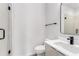 This bathroom has a vanity and a glass-door shower with white and gray tiling at 105 Georgia Se Ave # 4, Atlanta, GA 30312