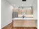 Modern kitchen featuring a white marble countertop, stainless steel appliances, and light wood cabinets at 105 Georgia Se Ave # 4, Atlanta, GA 30312