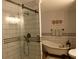 Elegant bathroom with clawfoot tub, subway tile shower, and modern fixtures at 259 Gramling Trl, Canton, GA 30114