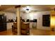 Spacious kitchen featuring white cabinets, dark countertops, stainless steel appliances, and an island at 259 Gramling Trl, Canton, GA 30114