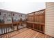 Wooden back deck providing an outdoor space for relaxing and enjoying the neighborhood view at 3195 Bartee Walk, Suwanee, GA 30024