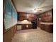 View of the kitchen with brown cabinets, tile flooring, and appliances at 5121 Newark Ave, Clarkdale, GA 30111