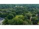 Aerial view of property surrounded by lush trees and greenery at 663 Clifton Ne Rd, Atlanta, GA 30307