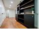 Hardwood floors accentuate this basement cabinet and storage area with shelving and drawers at 663 Clifton Ne Rd, Atlanta, GA 30307