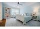 Bright bedroom featuring a large window and built-in bookcase at 663 Clifton Ne Rd, Atlanta, GA 30307