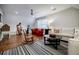 Bright bonus room featuring hardwood floors, modern furnishings, and inviting seating options for comfortable living at 663 Clifton Ne Rd, Atlanta, GA 30307