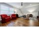 Bright bonus room with hardwood floors, comfortable seating, a ceiling fan and plenty of natural light at 663 Clifton Ne Rd, Atlanta, GA 30307