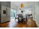 Bright dining room with stainless appliances, hardwood floors, and a view to the backyard at 663 Clifton Ne Rd, Atlanta, GA 30307