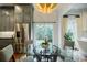Eat-in kitchen featuring gray cabinets, stainless appliances and a backyard view at 663 Clifton Ne Rd, Atlanta, GA 30307