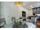 Open kitchen with hardwood floors, gray cabinets, granite countertop and modern appliances at 663 Clifton Ne Rd, Atlanta, GA 30307