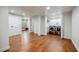 Bright laundry area with stainless steel washer/dryer, built in shelving and wood-look floors at 663 Clifton Ne Rd, Atlanta, GA 30307
