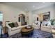 Open living room with a blue area rug and many seating options at 663 Clifton Ne Rd, Atlanta, GA 30307