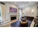 Cozy living room with a fireplace and a view of backyard at 663 Clifton Ne Rd, Atlanta, GA 30307