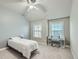 Bedroom with neutral walls, plush carpet, a ceiling fan, and a bright desk and chair at 5445 Whisper Ct, Cumming, GA 30028