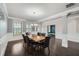 Elegant dining room featuring hardwood floors and stylish decor at 5445 Whisper Ct, Cumming, GA 30028