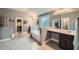 Main bathroom features dual sinks, a soaking tub, a separate shower, and a walk-in closet at 5445 Whisper Ct, Cumming, GA 30028