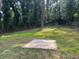 Well-maintained backyard featuring a lush lawn and perimeter fence line at 2349 Ousley Ct, Decatur, GA 30032