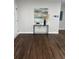 Stylish entryway with hardwood floors, a modern console table, artwork, and natural light at 2349 Ousley Ct, Decatur, GA 30032