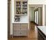Custom butler's pantry offering glass-front cabinets, marble countertops, and a built-in coffee machine at 2876 White Oak Dr, Decatur, GA 30032