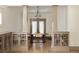 Elegant dining room with modern lighting and a round table set for four at 2876 White Oak Dr, Decatur, GA 30032
