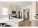 Bright kitchen featuring white countertops, modern appliances, and a stylish tile backsplash at 2876 White Oak Dr, Decatur, GA 30032