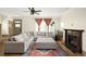 Spacious living room with a fireplace and a comfortable gray sectional sofa at 2876 White Oak Dr, Decatur, GA 30032