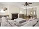 Bright living room showcasing an inviting fireplace and open dining area at 2876 White Oak Dr, Decatur, GA 30032