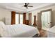 Spacious main bedroom with french doors and an en-suite bathroom entrance at 2876 White Oak Dr, Decatur, GA 30032