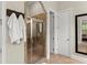 Bathroom featuring a glass-door shower with tile surround and decorative towel rack at 4896 Locklear Way, Marietta, GA 30066