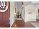 Elegant foyer with soaring ceilings, hardwood floors, and detailed trim work at 4896 Locklear Way, Marietta, GA 30066