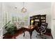 Bright home office with custom shelving, plantation shutters, and hardwood floors at 4896 Locklear Way, Marietta, GA 30066