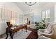 Cozy home office with hardwood floors, neutral paint, and french door entry at 4896 Locklear Way, Marietta, GA 30066
