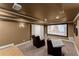 Home theater with large screen, comfortable seating, and recessed lighting at 4896 Locklear Way, Marietta, GA 30066