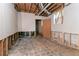 Unfinished basement space with exposed framing, offering potential for customization at 2582 Springdale Sw Rd, Atlanta, GA 30315