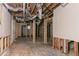 Spacious unfinished basement with exposed utilities and framing at 2582 Springdale Sw Rd, Atlanta, GA 30315