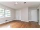 Spacious bedroom featuring hardwood floors, ample natural light, and closet space at 2582 Springdale Sw Rd, Atlanta, GA 30315