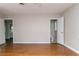 Spacious bedroom with hardwood floors and a view of an ensuite bathroom at 2582 Springdale Sw Rd, Atlanta, GA 30315