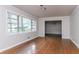 Spacious living room featuring hardwood floors and a large window for ample natural light at 2582 Springdale Sw Rd, Atlanta, GA 30315